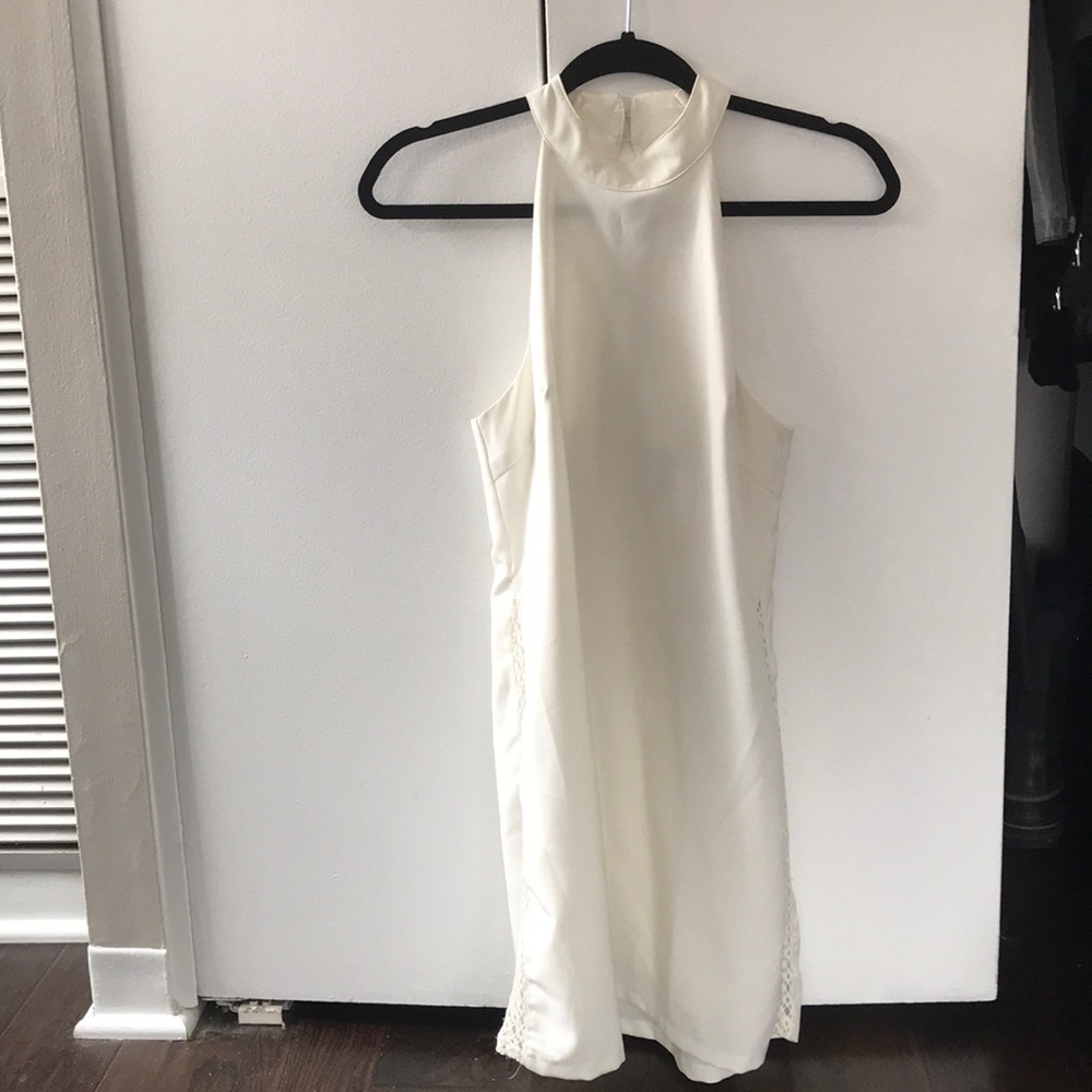 White high neck dress with lace detail